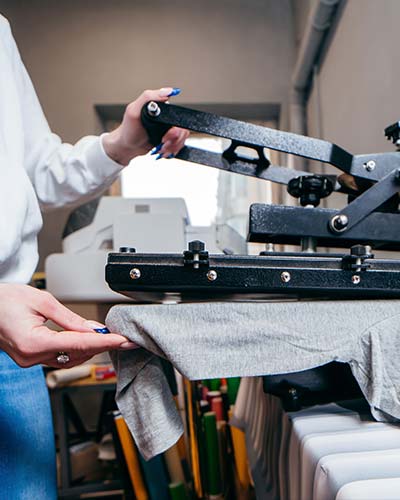 Machine doing Puff Screen Printing