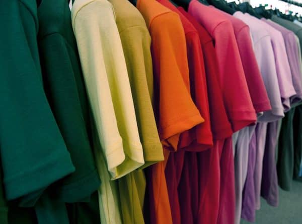 Different colours of t-shirt hanging